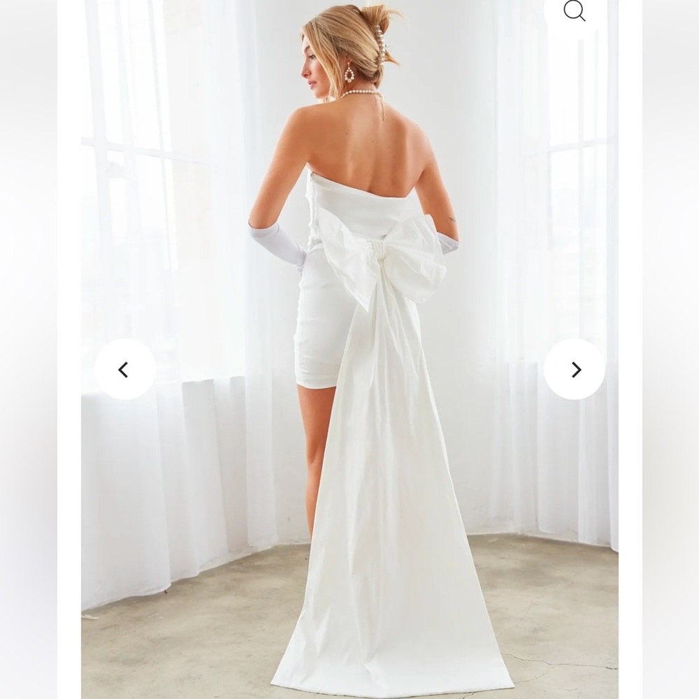 White mini dress with long detachable bow